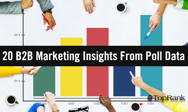 Group of people with hands on a large colorful data chart image.