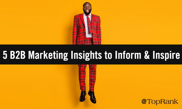 Black businessman in colorful suit jumping with marketing joy against yellow background image.