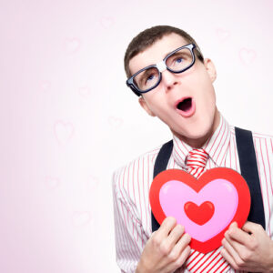 nerd holding heart